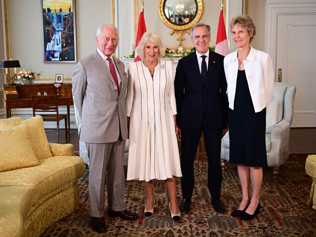 The Carney’s wife Diana Fox Carney was delighted to meet the king and queen. Picture: AFP