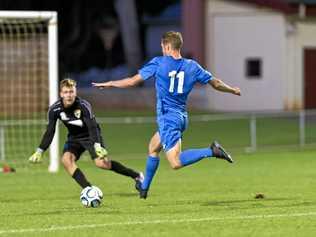 IN FORM: South West Queensland Thunder striker Chris Hatfield scores a goal against Gold Coast United. Hatfield is confident his side can record a third straight NPL win tonight when they host Brisbane City FC. Picture: Kevin Farmer