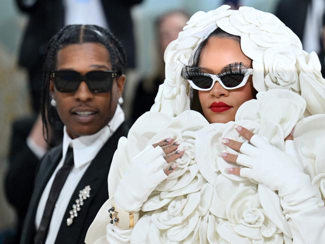 US rapper A$AP Rocky (L) and Barbadian singer/actress Rihanna arrive for the 2023 Met Gala at the Metropolitan Museum of Art on May 1, 2023, in New York. - The Gala raises money for the Metropolitan Museum of Art's Costume Institute. The Gala's 2023 theme is âKarl Lagerfeld: A Line of Beauty.â (Photo by Angela WEISS / AFP)