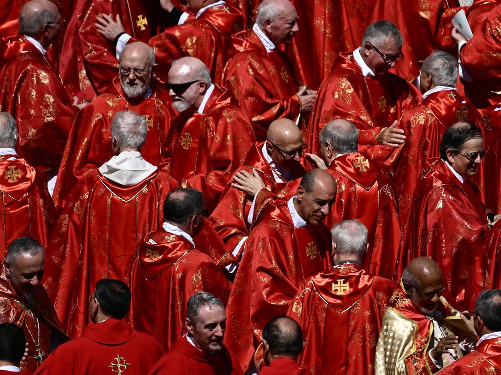 Cardinals embrace after Pope Francis’s funeral. Picture: AFP