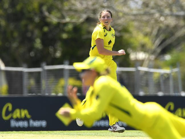 Darcie Brown of Australia watches on as Meg Lanning attempts to catch a ball during game one of the Women's One Day International series between Australia and India at Great Barrier Reef Arena on September 21, 2021 in Mackay, Australia. Picture: Albert Perez/Getty Images