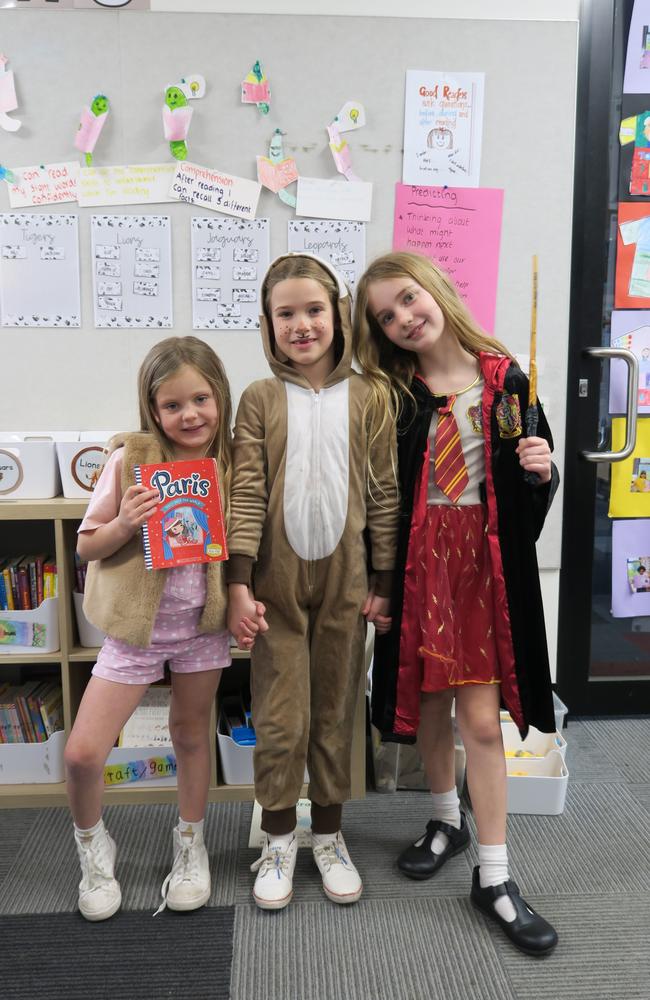 Elwood Primary School students Londyn Peel Paris, Goldie Leggatt and Poppy Eccleston have chosen their favourite book characters. Picture: Gemma Scerri.