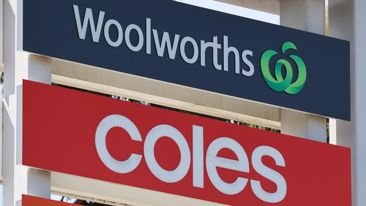 coles and woolies signs together