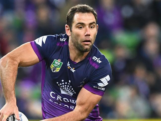 MELBOURNE, AUSTRALIA - SEPTEMBER 03: Cameron Smith of the Storm passes the ball during the round 26 NRL match between the Melbourne Storm and the Cronulla Sharks at AAMI Park on September 3, 2016 in Melbourne, Australia. (Photo by Quinn Rooney/Getty Images)