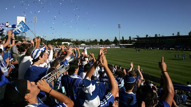 South Melbourne’s active support end rises ahead of a National Soccer League clash with Marconi.