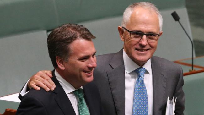 Jamie Briggs with Malcolm Turnbull in Parliament.