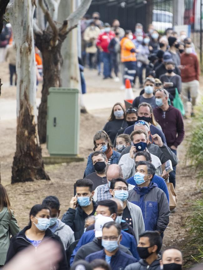 Long queues of people are seen at the NSW Vaccination Centre in Homebush on July 1. Picture: Jenny Evans/Getty