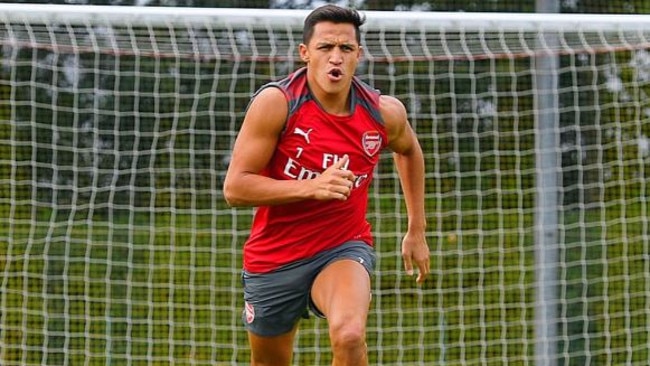 Alexis Sanchez returns to Arsenal training.