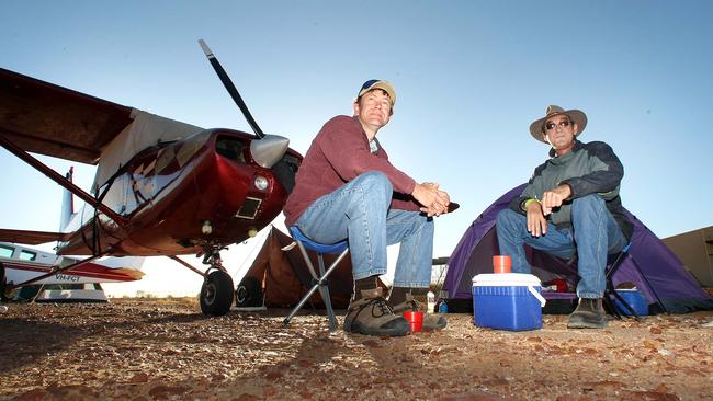 Owen Ruschen and Ian Dewick, camping next to their plane, flew in from Wagga.