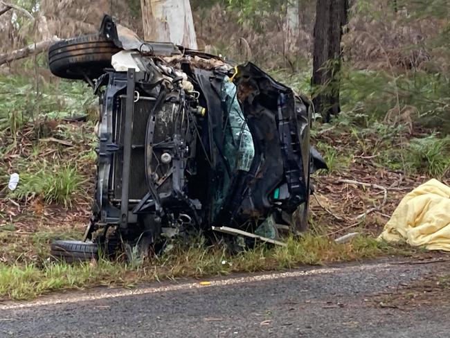 Emergency crews  at the scene of a crash on Rainbow Beach Road  on Tuesday where two people were treated for injuries. Photos: Scott Kovacevic