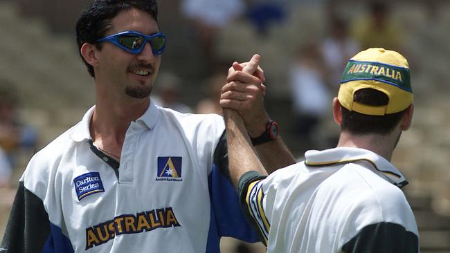 Jason Gillespie and Damien Fleming, forever and always fellow grapple fans.