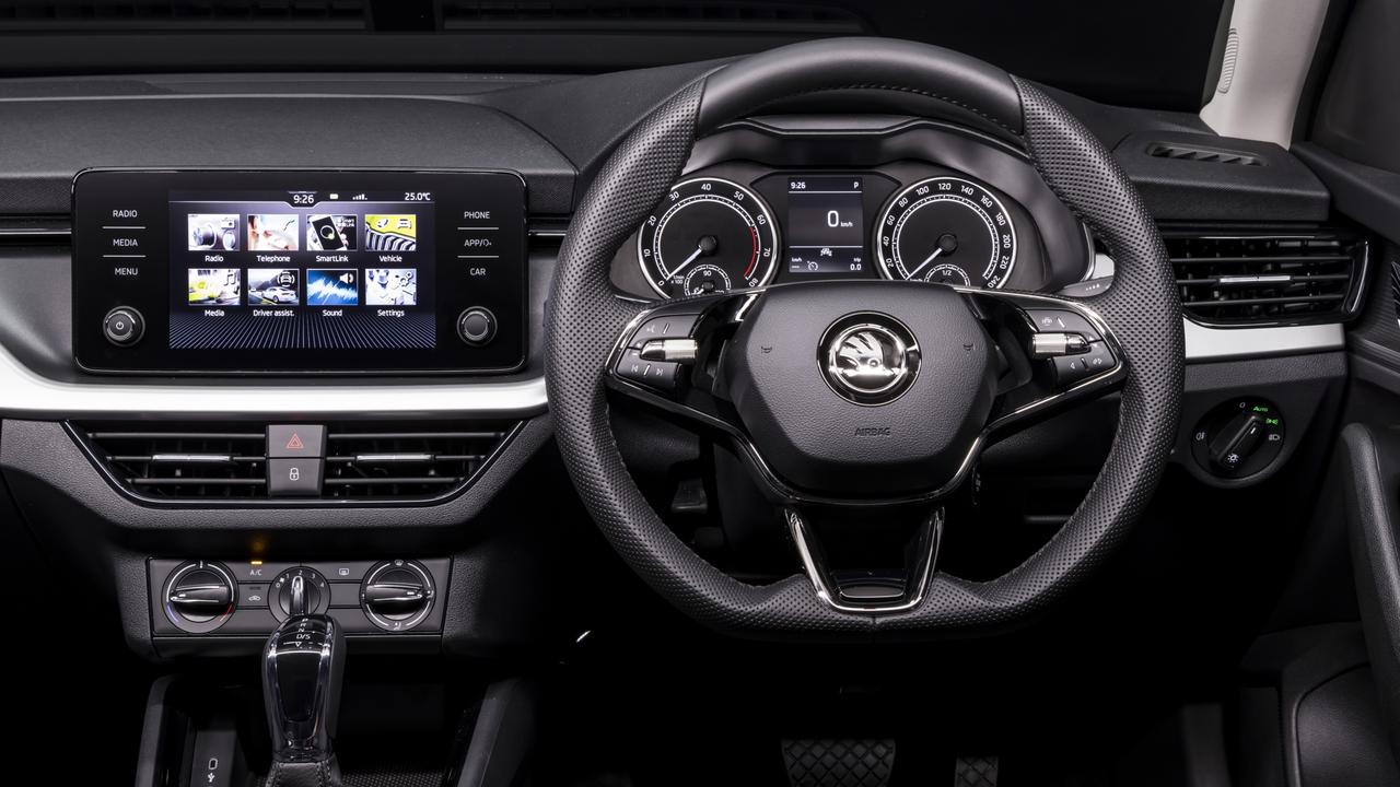 The interior lacks some hi-tech features of pricier variants.