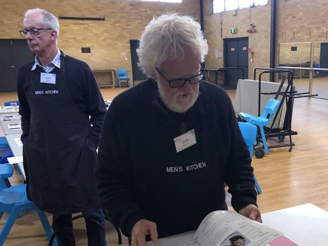 John Shirbin, 72 (left) of Potts Point, with Bob Robinson, 74, of Belrose at the Men's Kitchen cooking session at Forestville Community Hall. Picture: Jim O'Rourke