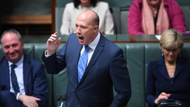 Peter Dutton is blaming refugee advocates and the Greens for the ongoing Manus Island stand-off as detainees at the mothballed centre dig holes in search of water. Picture: AAP