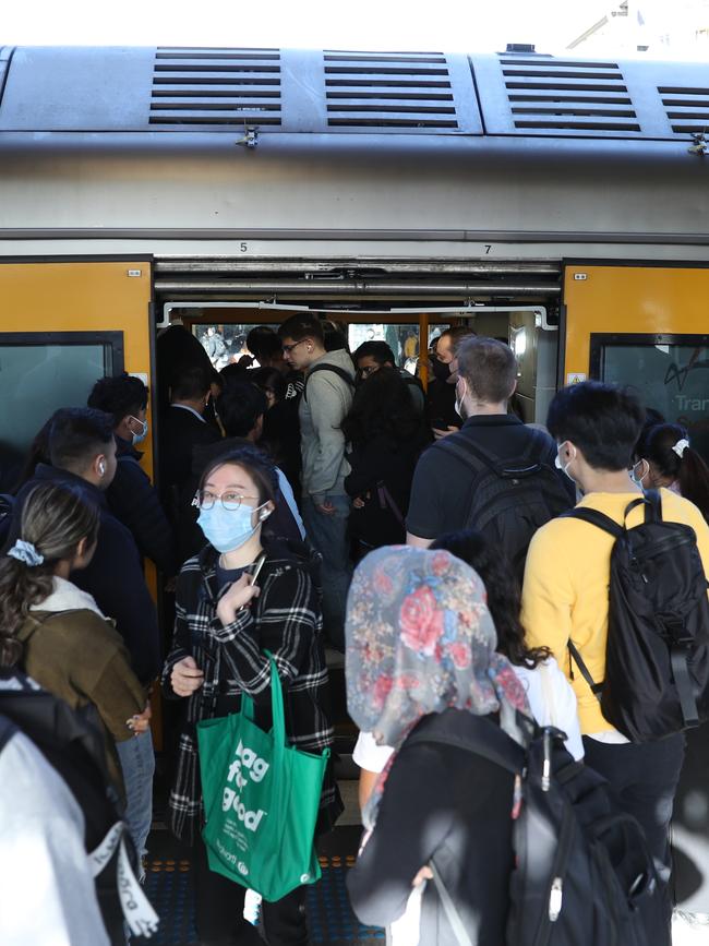 Commuters pack onto trains maid strike action. Picture: John Grainger