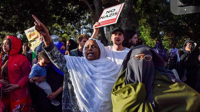 Hundreds of protesters turned out to blast supporters of Milo Yiannopoulos as they attended his Melbourne speaking event. Picture: Jake Nowakowski