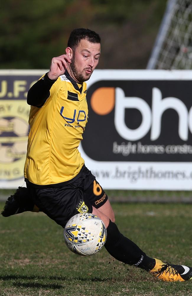 Sunbury United’s Steven Everett (right) takes off during his side’s loss to FC Strathmore on Saturday. Picture: Hamish Blair.