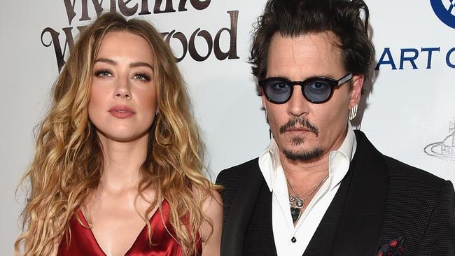 CULVER CITY, CA - JANUARY 09: Actors Amber Heard (L) and Johnny Depp attend The Art of Elysium 2016 HEAVEN Gala presented by Vivienne Westwood & Andreas Kronthaler at 3LABS on January 9, 2016 in Culver City, California. (Photo by Jason Merritt/Getty Images for Art of Elysium)