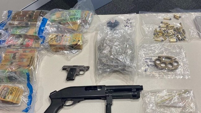 Cash, drugs and guns seized from two north Brisbane homes. Picture: Queensland Police Service