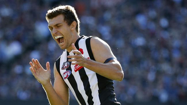 Collingwood's Adam Oxley celebrates a goal.