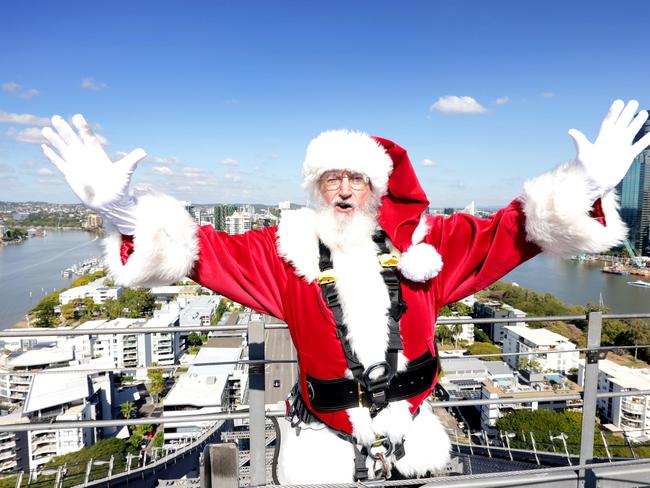 Santa scales the Story Bridge in search for new Christmas recruits, on Friday 28th June 2024 - Photo Steve Pohlner