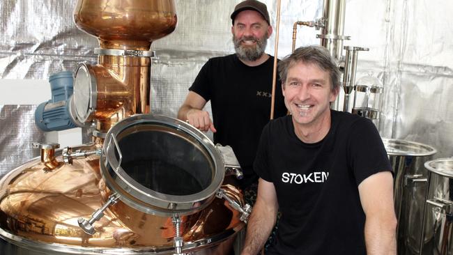 Stoken creators Brett Curtis (back) and Dr John Meulet at their Cudgera Creek distillery where they handicraft Stoken gin.