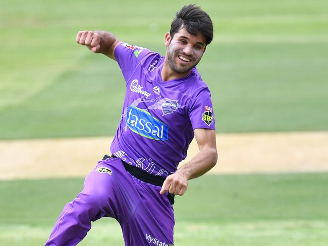 Qais Ahmad of the Hurricanes celebrates the dismissal of Tom Curran of the Sydney Sixers on Friday. Picture: AAP