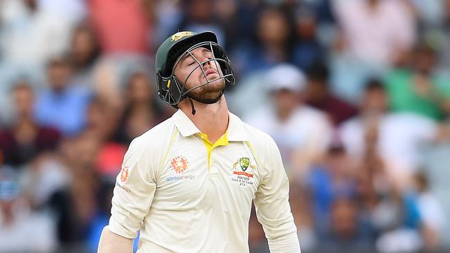 MELBOURNE, AUSTRALIA - DECEMBER 29: Travis Head of Australia reacts after being bowled during day four of the Third Test match in the series between Australia and India at Melbourne Cricket Ground on December 29, 2018 in Melbourne, Australia. (Photo by Quinn Rooney/Getty Images)