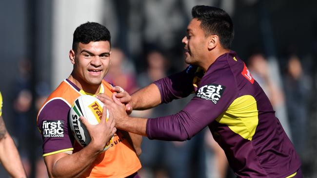 David Fifita (left) and Alex Glenn (right) in action during a Brisbane Broncos training session at Clive Berghofer Field in Brisbane, Thursday, July 19, 2018. The Broncos are playing their round 19 NRL match against the Penrith Panthers on Friday night in Brisbane. (AAP Image/Darren England) NO ARCHIVING