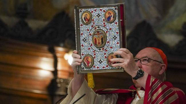 US Cardinal Kevin Joseph Farrell presides over a vigil service for George Floyd in Rome's Santa Maria in Trastevere Church last Friday. Picture: AFP