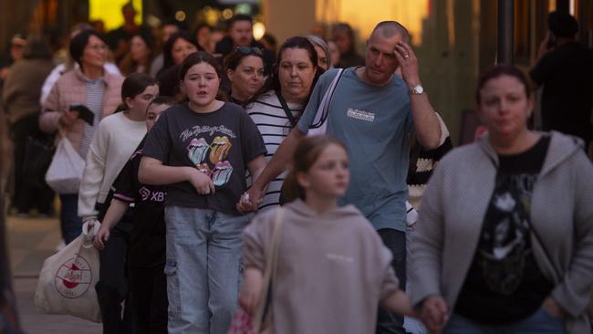 Westfield Marion shoppers flee the building. Picture: Brett Hartwig