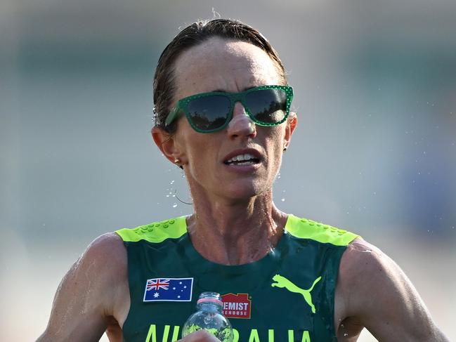 BUDAPEST, HUNGARY - AUGUST 26: Lisa Weightman of Team Australia takes a drink whilst competing in Women's Marathon during day eight of the World Athletics Championships Budapest 2023 at Heroes' Square on August 26, 2023 in Budapest, Hungary. (Photo by Hannah Peters/Getty Images)