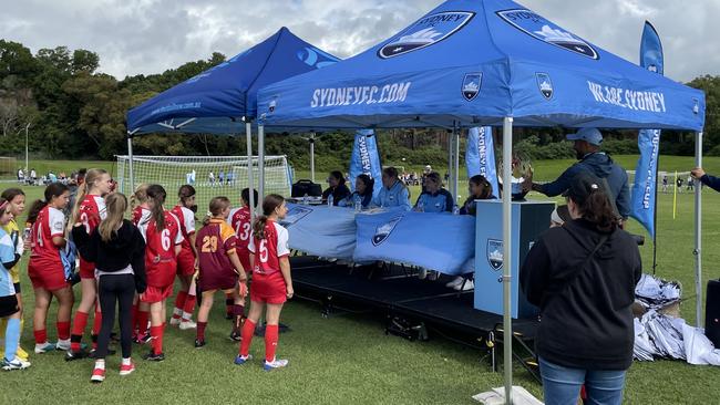 Sydney FC Women stars signing autographs at the Female Football Festival. Photo: Kevin Merrigan