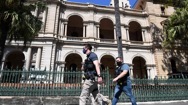 Police patrol outside Parliament House in Brisbane. Picture: NCA NewsWire / Dan Peled