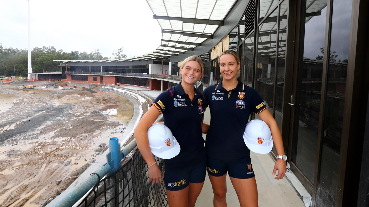 AFLW Lions players Lily Postlethwaite and Nat Grinder check out the new $80 million-dollar training facility at Springfield on May 9, 2022. Picture: David Clark