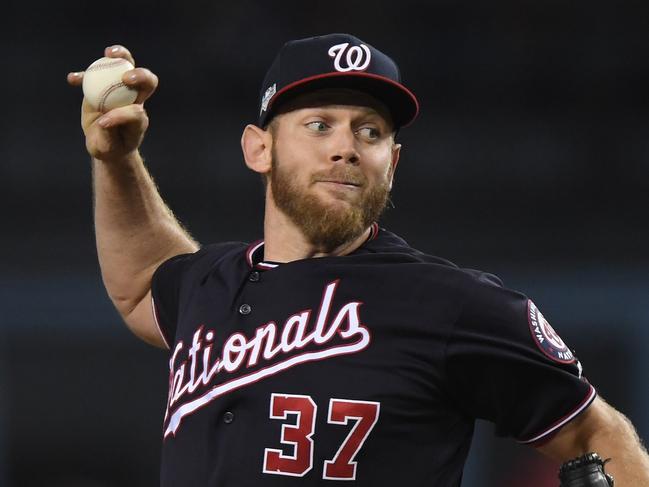 LOS ANGELES, CALIFORNIA - OCTOBER 04: Stephen Strasburg #37 of the Washington Nationals pitches against the Los Angeles Dodgers in the first inning in game two of the National League Division Series at Dodger Stadium on October 04, 2019 in Los Angeles, California.   Harry How/Getty Images/AFP == FOR NEWSPAPERS, INTERNET, TELCOS & TELEVISION USE ONLY ==