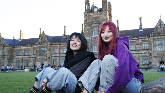 Chinese students Cloris Jiang (left) and Adrian Hanhui at Sydney University last year. Picture: John Feder.