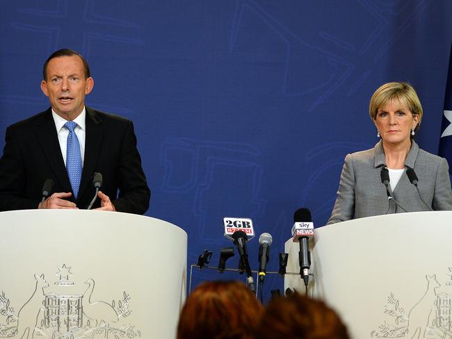 Resolute: Tony Abbott speaks alongside Foreign Minister Julie Bishop, saying Russia could not “wash its hands of responsibility” for the Malaysia Airlines crash. AFP PHOTO / SAEED KHAN