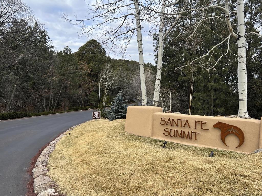 The entrance to the gated community where actor Hackman lived. Picture: Roberto Rosales/AP