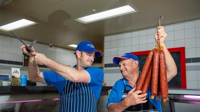 Joel Schmidt, with his father Peter Schmidt, will expand the Gatton Meat Centre into a new building by mid next year. Photo: Ali Kuchel