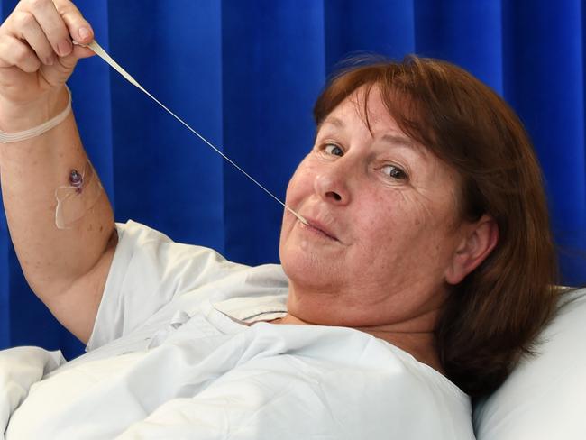 Patients are being given chewing gum after surgery at Royal Melbourne Hospital as part of a medical trial to determine if it can help them overcome the nausea many experience after an opperation. Patient is Leeanne (with double 'e') Whitfield staff member is Christie Golding, Associate Nurse Unit Manager. Picture:Tony Gough