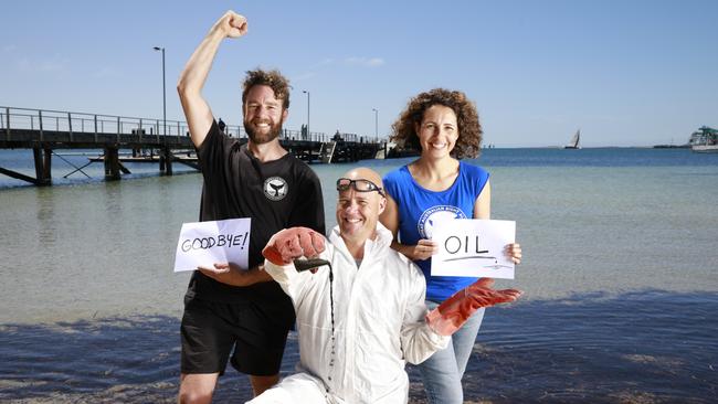 Port Lincoln locals celebrate the news of Equinor deciding not to drill for oil in the Bight: Dan Treagus (head brewer of Beer Garden Brewing ) with Matt Waller (Adventure Bay Charters ) and Janie Butterworth (co-owner of Beer Garden Brewing ). Picture: Robert Lang