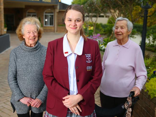 Residents Barbara and Ursel with Rosie. Rosie Spurr, year 12 student of Brigidine College, won the Lion's award for her volunteer work with aged care centre residents of Turramurra House.