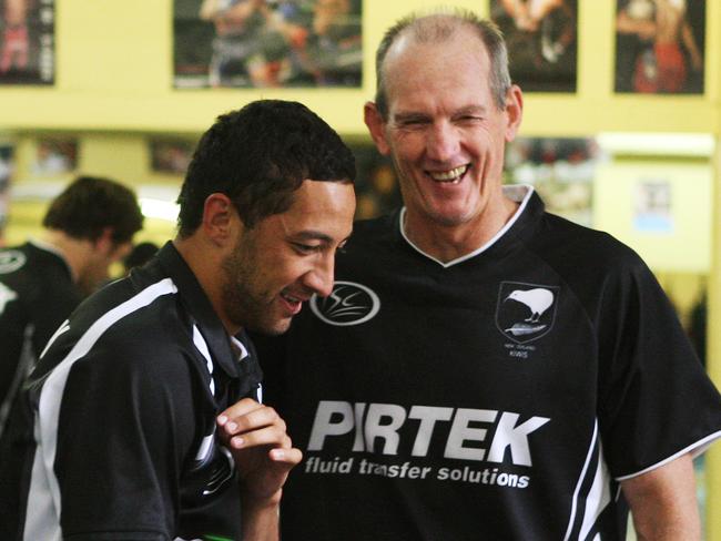 Benji Marshall with Wayne Bennett share a joke during a Kiwis training session.