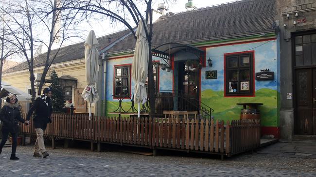 eople walk trough the Skadarlija bohemian quarter in Belgrade.