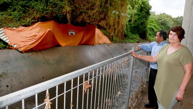 At their wit’s end: Granville residents Kerrie Poyner and Sam Mitry at A’Becketts Creek. Picture: AAP IMAGE/Angelo Velardo