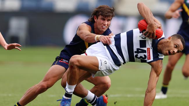 Josh Rachele ,pictured tackling Stefan Okunbor, is capable of providing special moments. Picture: Michael Klein