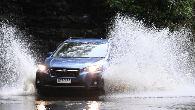 Heavy rainfall in southeast Queensland has parts of the state on flood warnings. Picture: NewsWire / John Gass