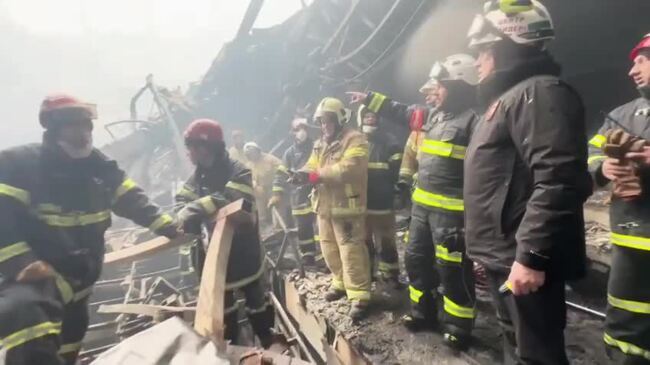 Firefighters Search for Bodies in Burned-Out Moscow Concert Hall