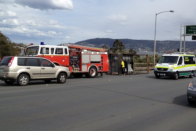 The back of a small rubbish truck blew off on the Tasman bridge creating traffic chaos for city-bound traffic.